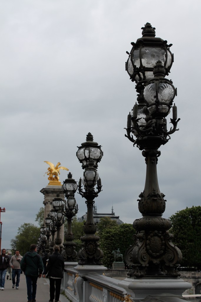 Walking across the Pont Alexandra.  While Paris isn't my most favorite city, it's impossible to deny the beauty & detail they put into every part of the city.